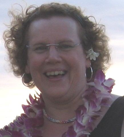 Anne Marie decked out in Hawaiin flowers, beads, and a fresh orchid lei on her recent trip to Maui.